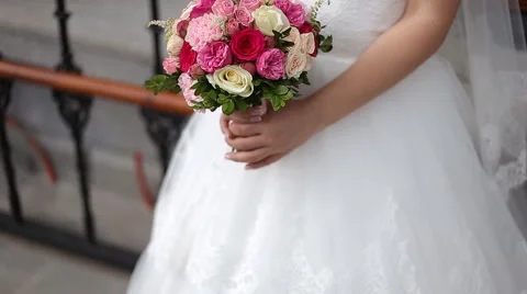 Closeup of bride hands holding beautiful bouquet Stock Footage 54028023