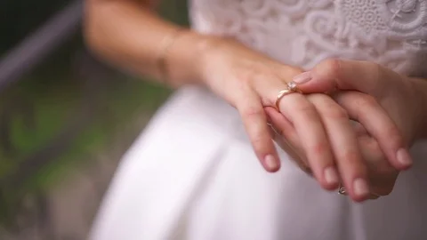 Closeup of bride watchin wedding ring Video stock 78630846
