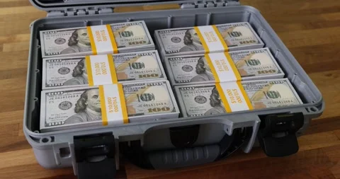 Closeup of briefcase full of stacks of dollar bills and cash Stock Footage 253637021