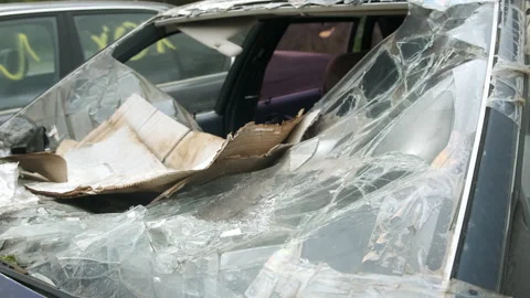 Closeup of broken front windshield on car after an accident. Stock Footage 145541874