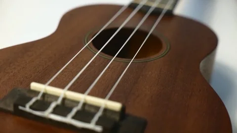 Closeup brown ukulele guitar Stock Footage 72407818