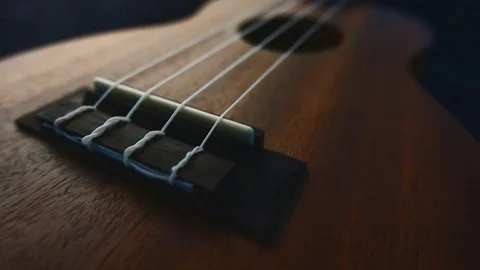 Closeup brown ukulele guitar. Stock Footage 72407985