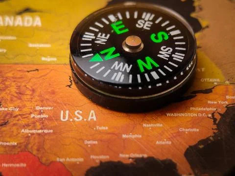 Closeup brown USA map with compass ,Venezuela's viral issue with the US Stock Photos