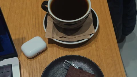 Closeup of brownie with workspace setting, Dessert and workspace elements Stock Footage 319467291