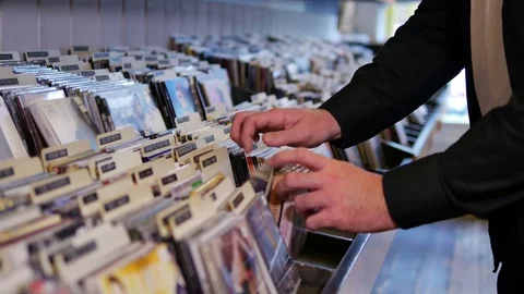 Closeup of browsing records in the vinyl record store Stock Footage 71166893