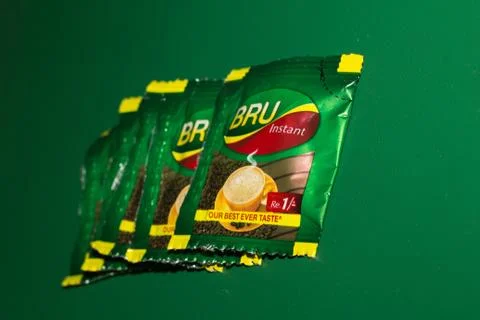 Closeup of Bru Instant Coffee Pack isolated on Green Background Stock Photos