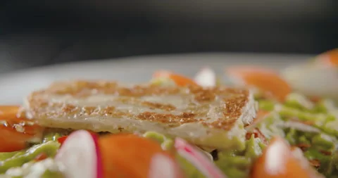 Closeup of bruschetta with cherry, radish and chicken cutlet. 4k slow motion Stock Footage 101371712