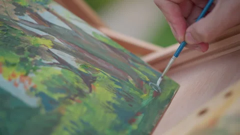 Closeup brush edging canvas corner on landscape painting border, tiny highlight Stock Footage 334060795