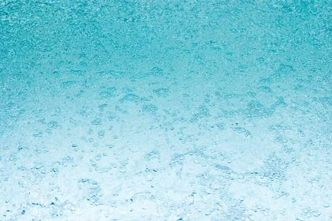 Closeup of bubbles in blue water Stock Photos