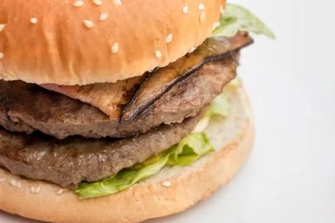Closeup of burger on white Stock Photos