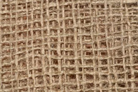 Closeup of a burlap texture. Burlap macro photography. Stock Photos
