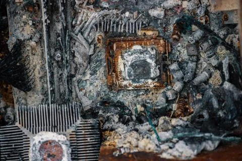 Closeup of a burned processor on a destroyed desktop computer Stockfoto's