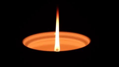Closeup of burning candle in dark background. Stock Footage 170092963