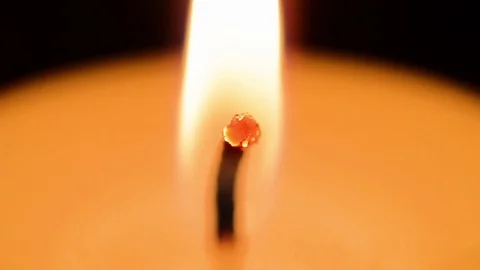 Closeup of a burning candle Stock Footage 74724528