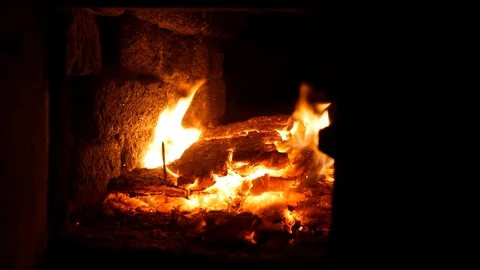 Closeup of burning logs in an old brick kiln. Stock-Footage 128399860