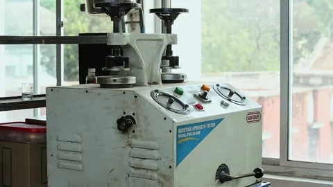 A closeup of bursting strength testing machine inside the soap factory 스톡 동영상 236411843