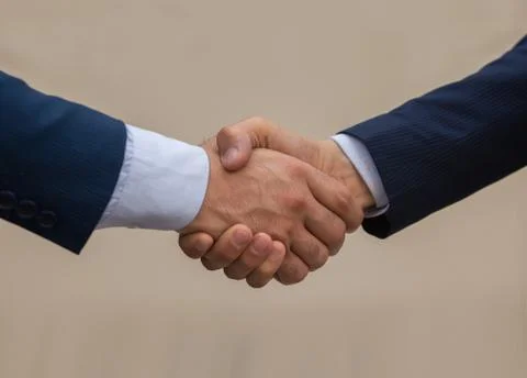 Closeup of a business handshake Stock Photos