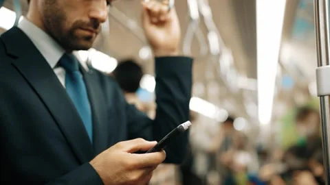 Closeup of business man hands looking phone while standing at train.Exultant. Stock Footage 264114787