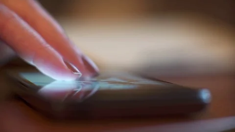 Closeup of business people using smart phone Stock Footage 69971481