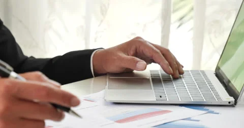 Closeup businessman hands working use laptop finance business document reading r Vídeo Stock 234176566