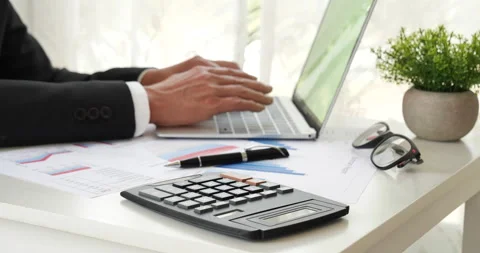Closeup businessman hands working use laptop finance business document reading r Stock-Footage 234176714