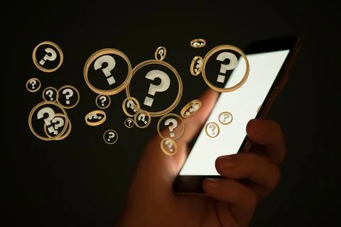 A closeup of a Businessman solving a problem with digital question marks 3D r Stock Photos