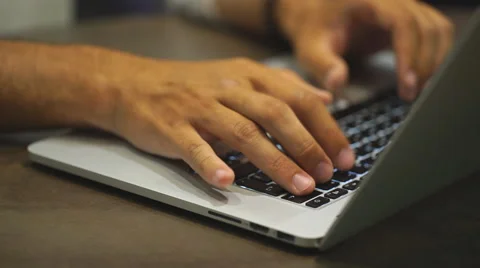 Closeup of businessman typing on laptop computer Stock Footage 67094980