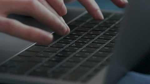 Closeup. Businessman using computer at home. Macro shoot of male hands while Stock Footage 107811890