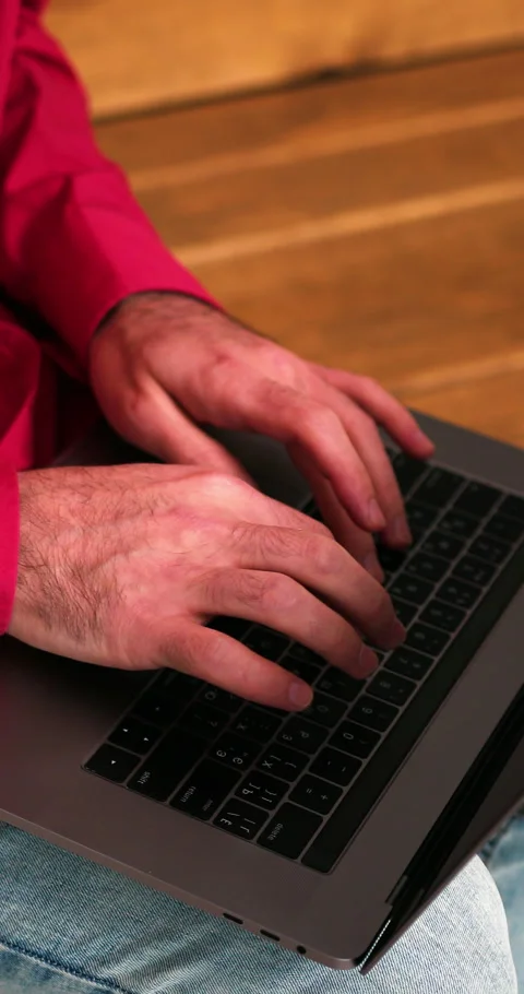Closeup, businessman using laptop, copywriter typing on keyboard, selective Stock Footage 330172636