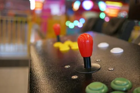 Closeup of button on games machine. Stock Photos