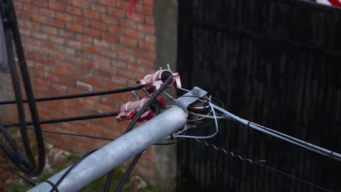 Closeup of cable connections on a concrete light pole in the Peruvian highlands Stock Footage 164617113