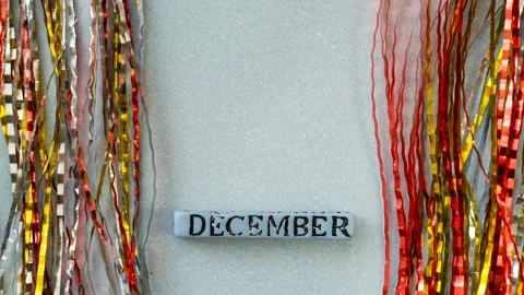 Closeup of a calendar with scrolling days in the month of December. Stock Footage 119882385