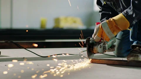 Closeup to the camera at construction site the concentrated worker using the Stock Footage 172574596