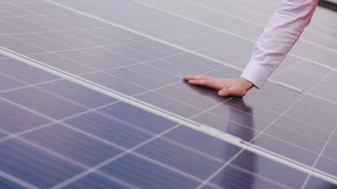 Closeup to the camera ecological engineer hands checking the operation of sun Stock Footage 164549867