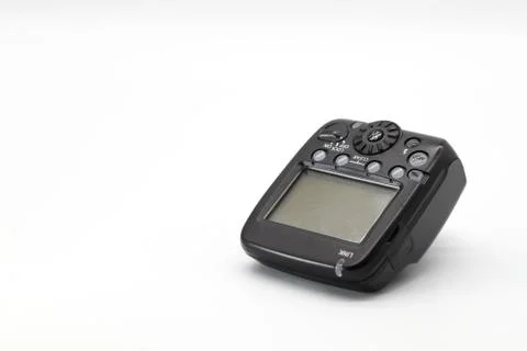 Closeup camera flash trigger on isolated background Stock Photos