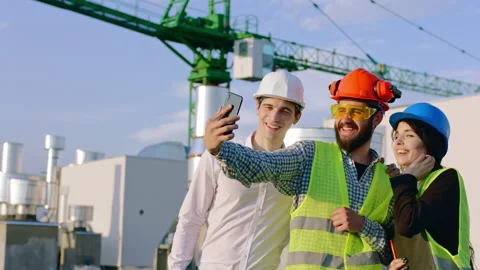 Closeup to the camera group of charismatic diverse specialists on the top of Stock Footage 143157516