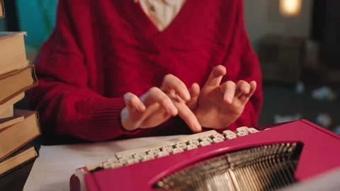 Closeup to the camera lady type some documents using eco machine typewriter Stock Footage 134059810