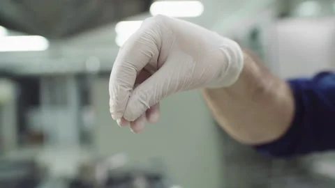 Closeup to the camera main chef of restaurant in the kitchen take some see salt Stock Footage 156176603
