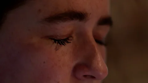 Closeup to the camera portrait crying hard depressed young woman Video stock 164844953