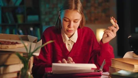 Closeup to the camera working lady concentrated in the office typing on the Stock Footage 144211708