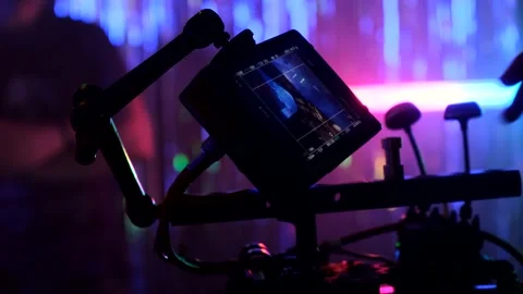 Closeup cameraman hand operating with camera Stock Footage 145364774