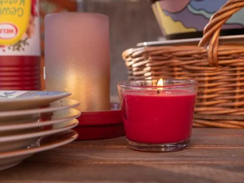Closeup of Candle on a Barbeque Table Stock Photos