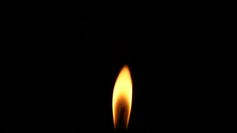 Closeup candle fire flame isolated burning on black background, slow motion HD Stock Footage 160314047