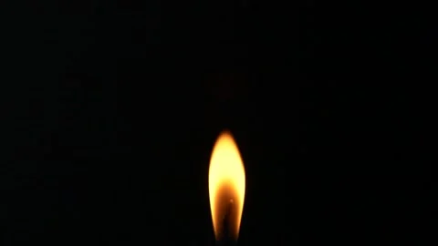 Closeup candle fire flame isolated burning on black background, slow motion HD Stock Footage 166425800