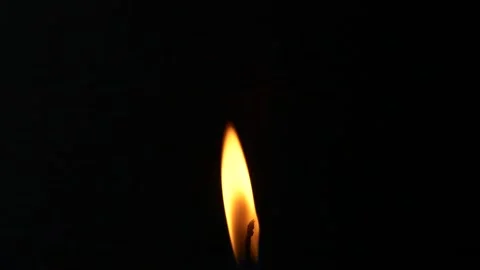 Closeup candle fire flame isolated burning on black background, slow motion HD Stock Footage 167444367