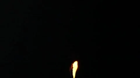 Closeup candle fire flame isolated burning on black background, slow motion HD Stock Footage 168117521