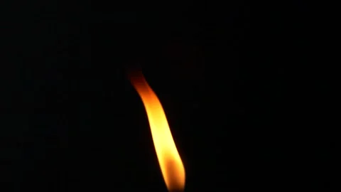 Closeup candle fire flame isolated burning on black background, slow motion HD Vídeos de archivo 168505339