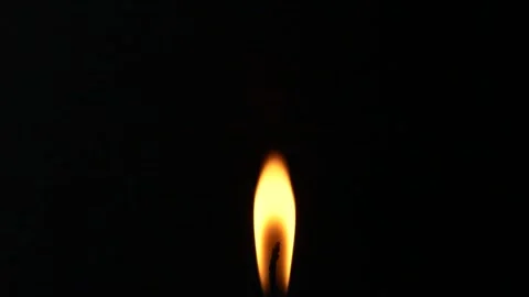 Closeup candle fire flame isolated burning on black background, slow motion HD Stock Footage 169331839
