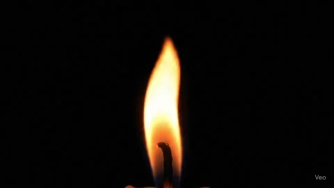 Closeup candle fire flame isolated burning on black background, slow motion canl Stock Footage 317577641
