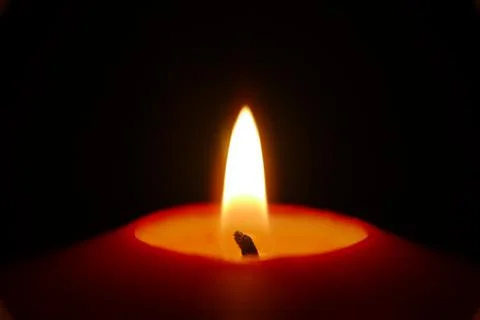 Closeup of a candle light Stock Photos